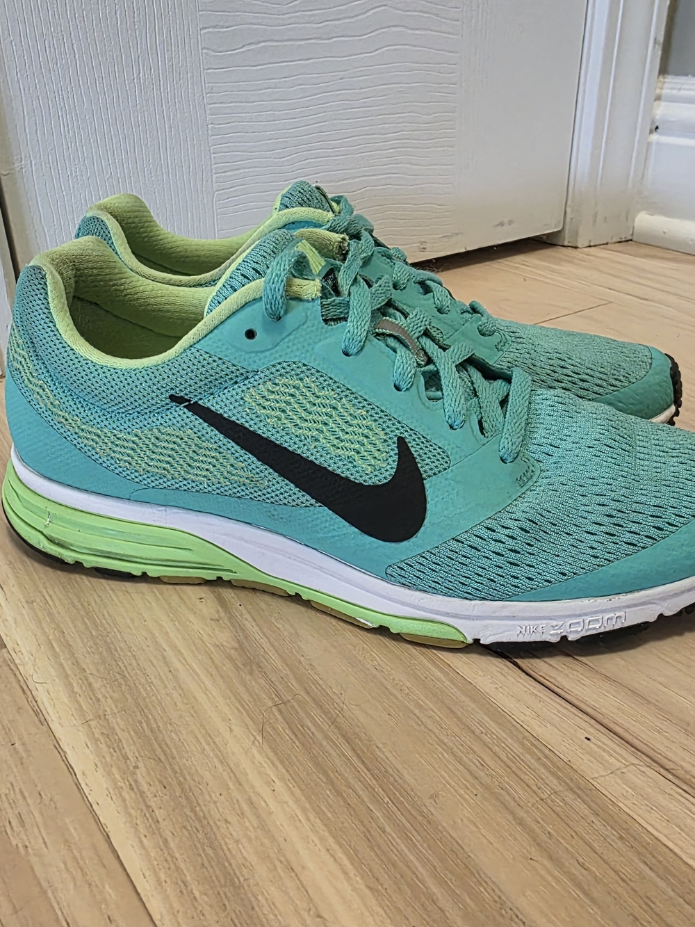 Nike Women's Teal Running Shoes with Lime Accents